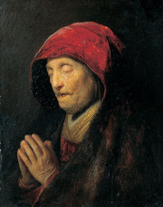Mujer vieja orando