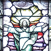 Partial picture of a vitral (stained glass) of the ascension of the Lord.